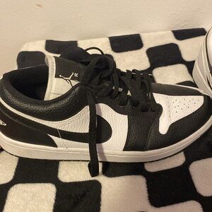 Black and white checkered Air Jordan 1s